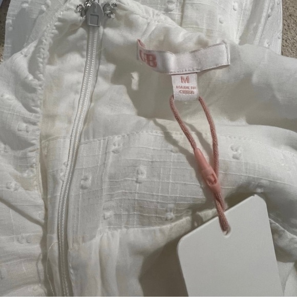 White Halter Neck Cutout Twist Front Clip Dot Fit and Flare Dress - Picture 6 of 6